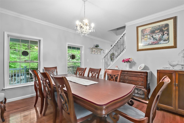 25 Crest Rd, Cold Spring, NY 10516 - dining area with a chandelier, stairway, ornamental molding, wood finished floors, and baseboards