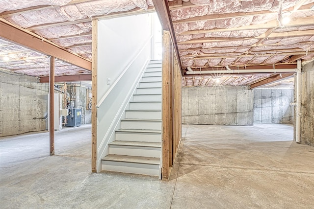 unfinished basement with stairs