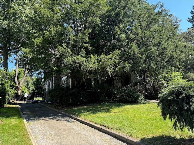 76 Long Dr, Hempstead, NY 11550 - view of asphalt road with curbs