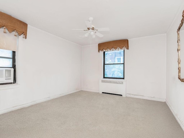 3215 Netherland Ave Unit 6C, Bronx, NY 10463 - empty room featuring radiator, carpet floors, and a ceiling fan