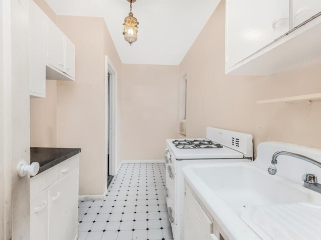 3215 Netherland Ave Unit 6C, Bronx, NY 10463 - washroom featuring baseboards and washer / clothes dryer