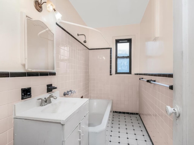 3215 Netherland Ave Unit 6C, Bronx, NY 10463 - full bath with tile walls, vanity, and bathtub / shower combination