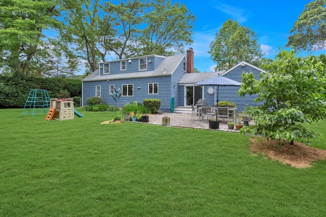 411 8th Ave, East Northport, NY 11731 - rear view of property featuring a playground, a patio, a yard, a chimney, and a shingled roof