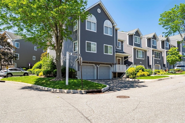 1 Mountain Ter, Nanuet, NY 10954 - view of property with a residential view, a garage, and driveway
