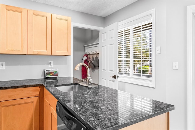 1 Mountain Ter, Nanuet, NY 10954 - kitchen featuring a sink, dishwashing machine, a textured ceiling, light brown cabinets, and a peninsula