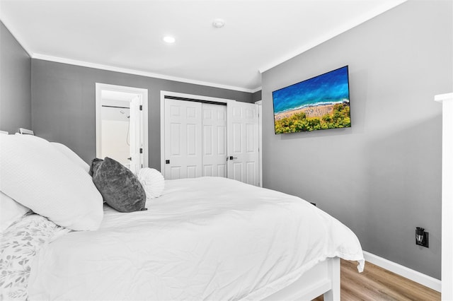 1 Mountain Ter, Nanuet, NY 10954 - bedroom featuring ornamental molding, light wood finished floors, baseboards, a closet, and recessed lighting