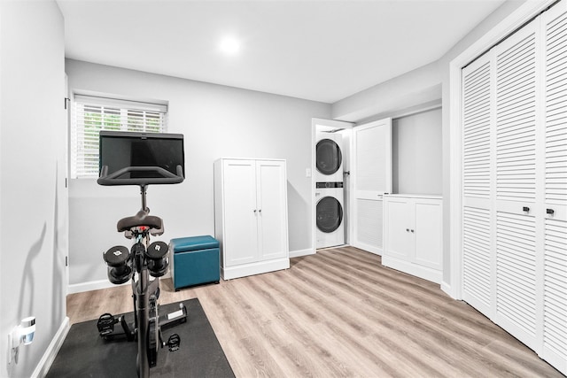 1 Mountain Ter, Nanuet, NY 10954 - exercise room with stacked washer / drying machine, wood finished floors, and baseboards