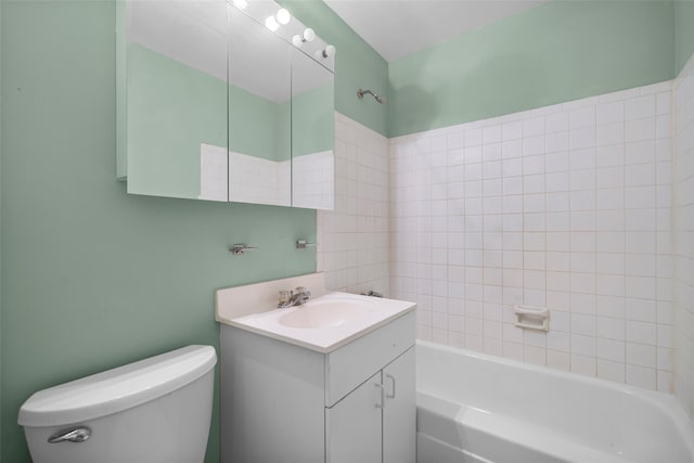 bathroom with toilet, vanity, and shower / tub combination