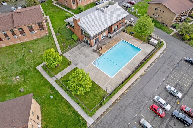 drone / aerial view of a pool area