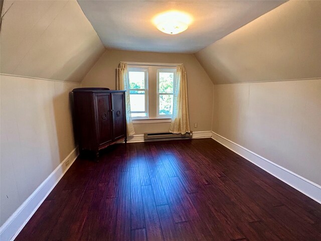 22 Herbert St, Beacon, NY 12508 - additional living space featuring dark wood-style floors, a baseboard heating unit, lofted ceiling, and baseboards