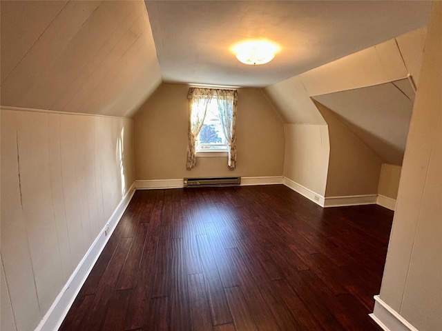 22 Herbert St, Beacon, NY 12508 - additional living space with a baseboard heating unit, wood-type flooring, lofted ceiling, and baseboards