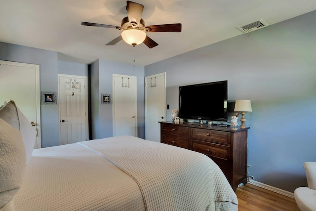 24 Harvard Ln, Commack, NY 11725 - bedroom with wood finished floors, baseboards, and a ceiling fan
