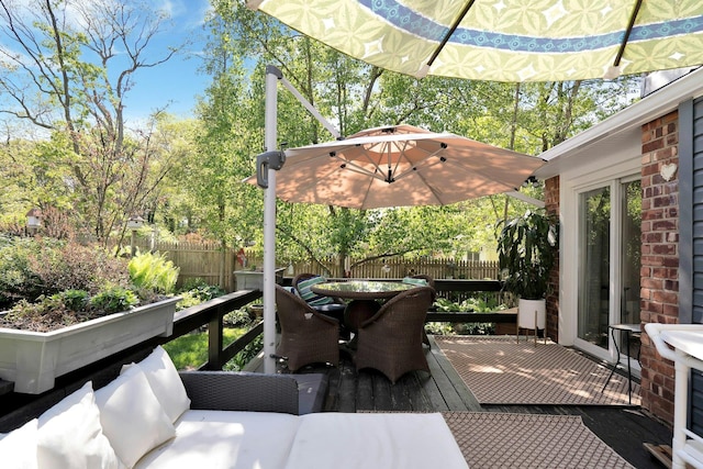 24 Harvard Ln, Commack, NY 11725 - wooden terrace with fence and outdoor dining space