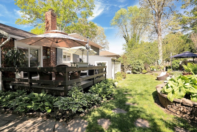 24 Harvard Ln, Commack, NY 11725 - view of green lawn featuring a wooden deck