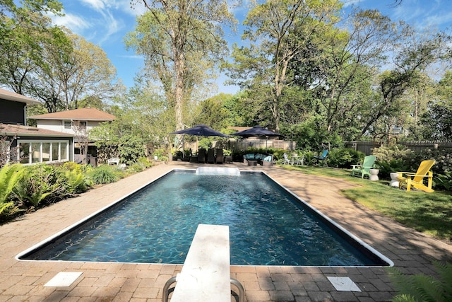 24 Harvard Ln, Commack, NY 11725 - view of pool with a fenced backyard, a diving board, and a patio area