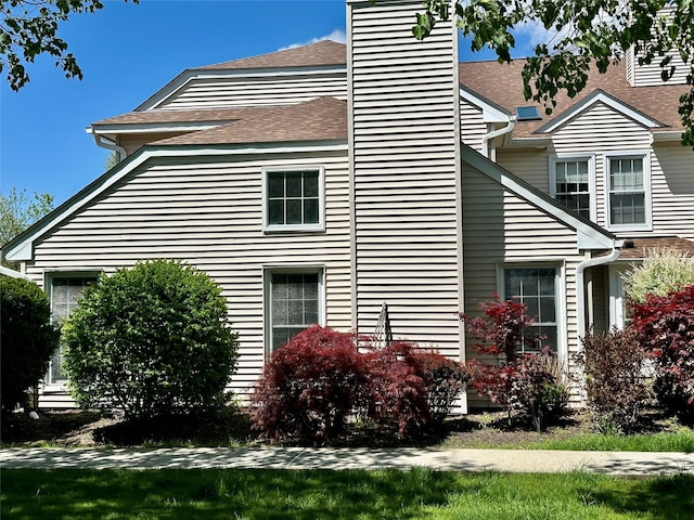 1 Olde Wagon Rd, Warwick, NY 10990 - view of side of home with roof with shingles and a chimney