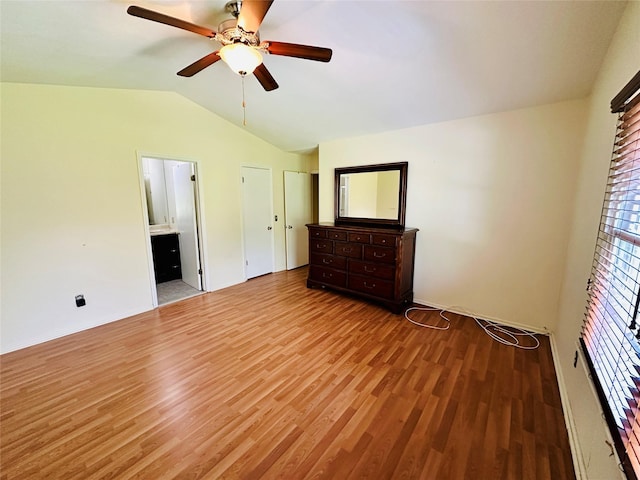 1 Olde Wagon Rd, Warwick, NY 10990 - unfurnished bedroom featuring wood finished floors, vaulted ceiling, ensuite bath, and ceiling fan