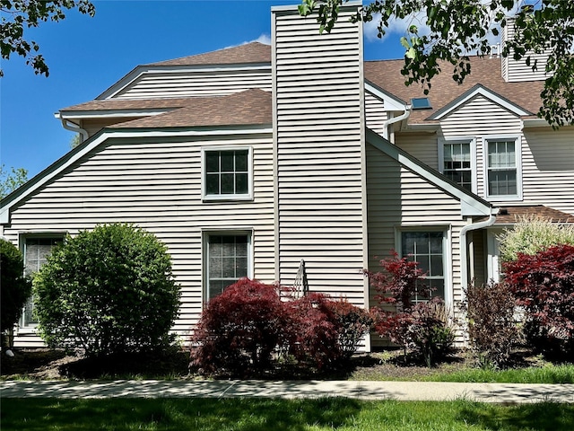 1 Olde Wagon Rd, Warwick, NY 10990 - view of side of home with a chimney and a shingled roof