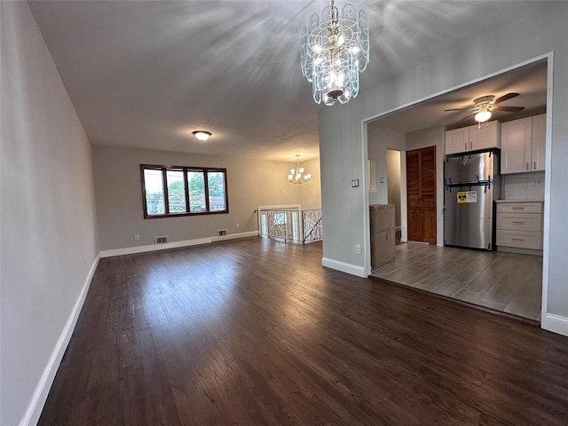 42 Blacker St, Brentwood, NY 11717 - unfurnished living room with a chandelier, dark wood-style flooring, baseboards, and a ceiling fan