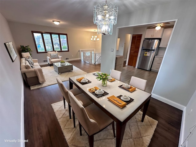 42 Blacker St, Brentwood, NY 11717 - dining room featuring a chandelier, baseboards, dark wood-style flooring, and a ceiling fan