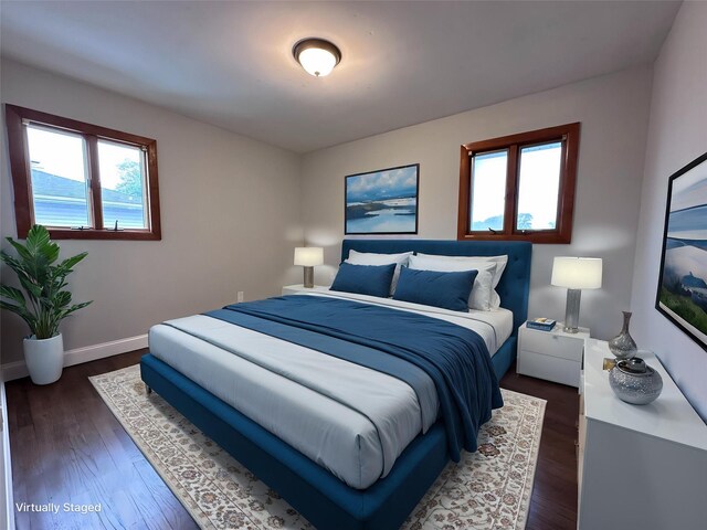 42 Blacker St, Brentwood, NY 11717 - bedroom with dark wood-type flooring and baseboards
