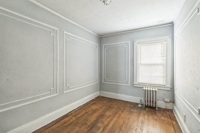 179-03 Selover Rd, Jamaica, NY 11434 - empty room with radiator, hardwood / wood-style floors, ornamental molding, and baseboards