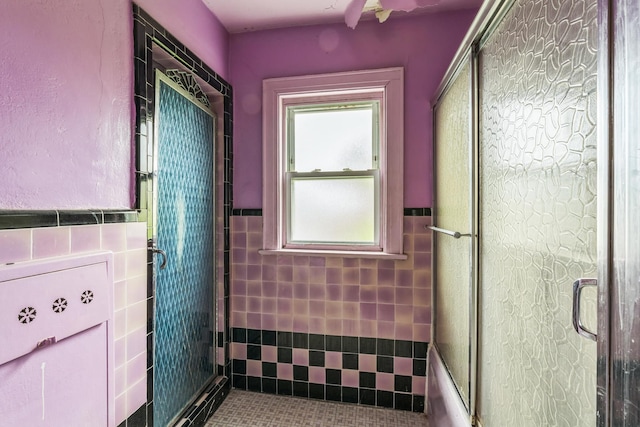 179-03 Selover Rd, Jamaica, NY 11434 - full bathroom with tile walls and a wainscoted wall