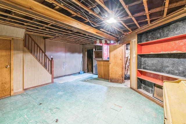 179-03 Selover Rd, Jamaica, NY 11434 - unfinished basement with stairs and tile patterned floors
