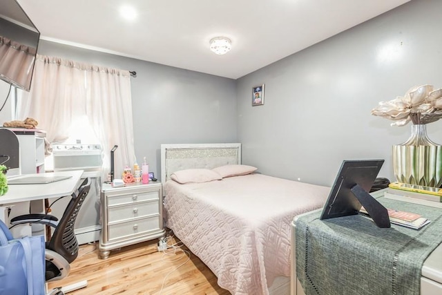 23118 145th Ave, Springfield Gardens, NY 11413 - bedroom with wood finished floors and a desk
