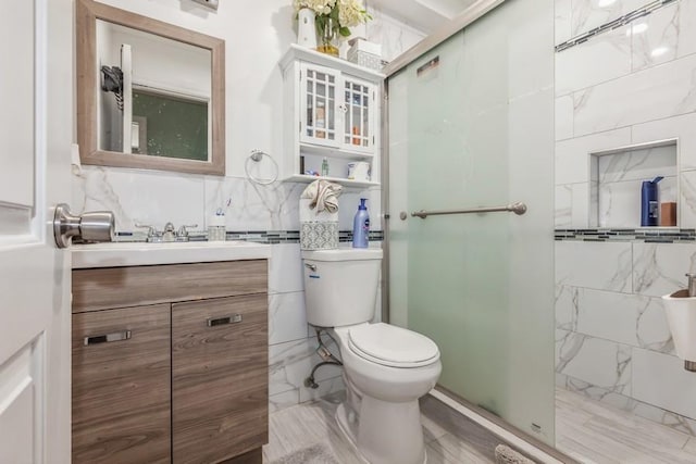 23118 145th Ave, Springfield Gardens, NY 11413 - full bathroom featuring a stall shower, toilet, and vanity
