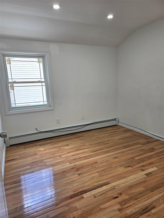 23118 145th Ave, Springfield Gardens, NY 11413 - unfurnished room featuring wood finished floors, a baseboard radiator, and recessed lighting