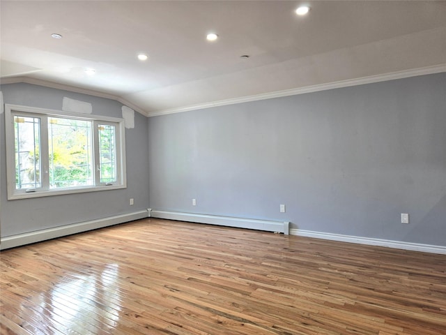 23118 145th Ave, Springfield Gardens, NY 11413 - empty room with lofted ceiling, ornamental molding, wood-type flooring, a baseboard heating unit, and recessed lighting