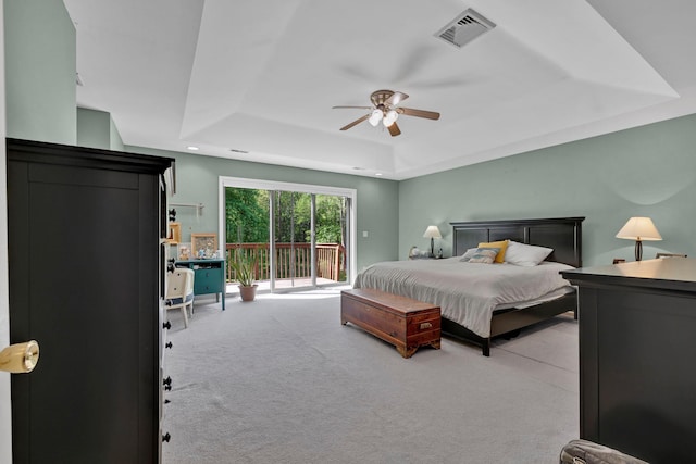 6 Edgewater Rd, Poughkeepsie, NY 12603 - carpeted bedroom featuring a tray ceiling, access to exterior, and a ceiling fan