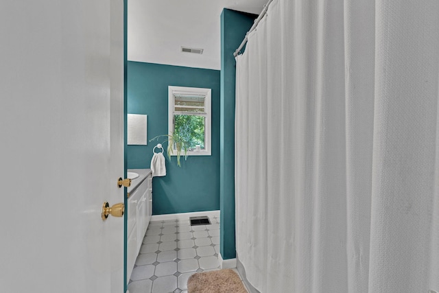 6 Edgewater Rd, Poughkeepsie, NY 12603 - bathroom featuring baseboards and vanity