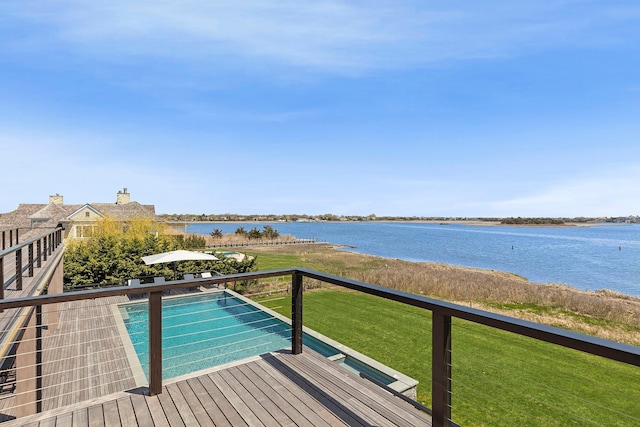 34 Westbridge Rd, Westhampton Beach, NY 11978 - view of swimming pool featuring a water view and a yard
