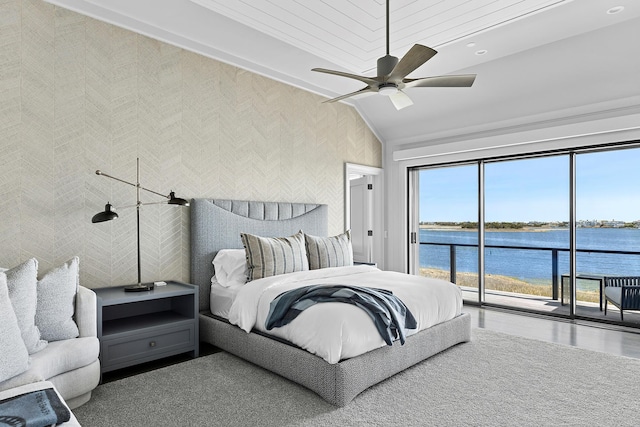 34 Westbridge Rd, Westhampton Beach, NY 11978 - bedroom with access to exterior, a water view, vaulted ceiling, wallpapered walls, and ceiling fan