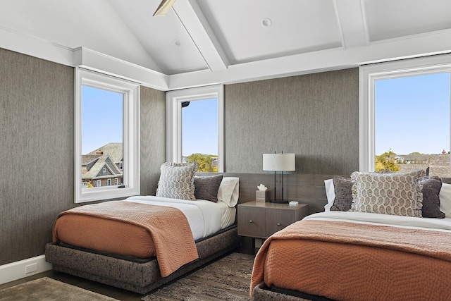 34 Westbridge Rd, Westhampton Beach, NY 11978 - bedroom with lofted ceiling, wood finished floors, and wallpapered walls