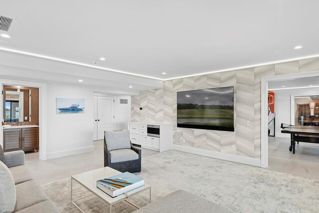 34 Westbridge Rd, Westhampton Beach, NY 11978 - living area with recessed lighting and baseboards