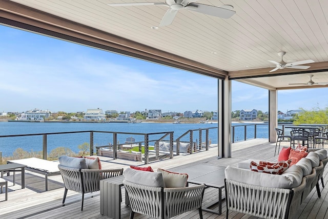 34 Westbridge Rd, Westhampton Beach, NY 11978 - deck featuring outdoor lounge area, ceiling fan, and a water view