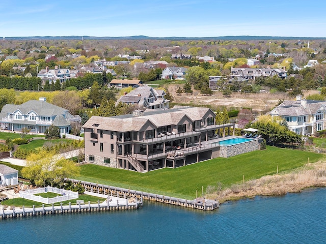 34 Westbridge Rd, Westhampton Beach, NY 11978 - aerial view of residential area featuring a large body of water and a pool area