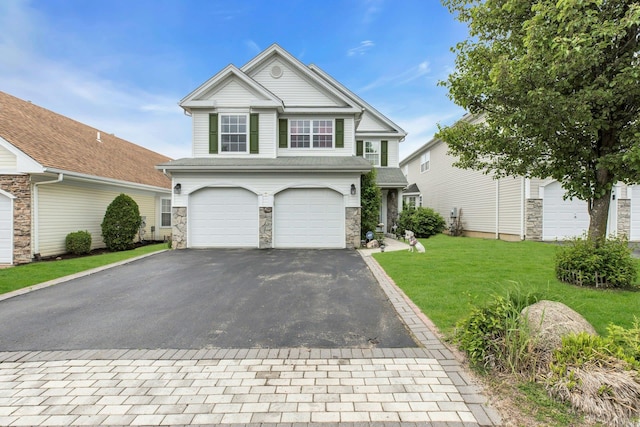 7 Marisa Dr, Middle Island, NY 11953 - view of front of property featuring asphalt driveway, stone siding, a garage, and a front lawn