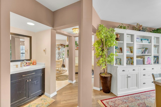 7 Marisa Dr, Middle Island, NY 11953 - bathroom featuring wood finished floors and vanity