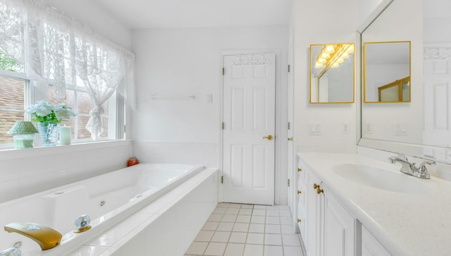 7 Marisa Dr, Middle Island, NY 11953 - bathroom featuring tile patterned floors, a whirlpool tub, and vanity