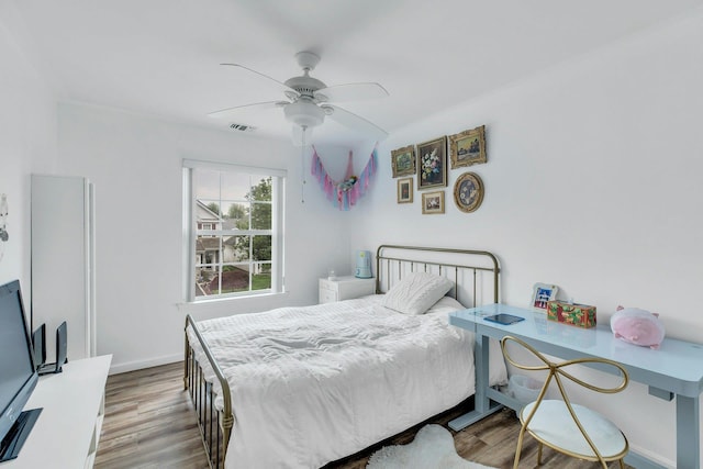 7 Marisa Dr, Middle Island, NY 11953 - bedroom featuring wood finished floors, baseboards, and ceiling fan