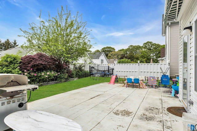 7 Marisa Dr, Middle Island, NY 11953 - view of patio featuring a trampoline