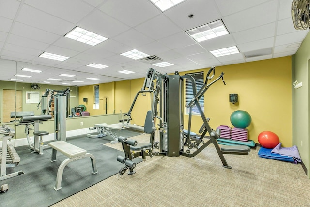 7 Marisa Dr, Middle Island, NY 11953 - gym featuring a paneled ceiling, baseboards, and carpet floors