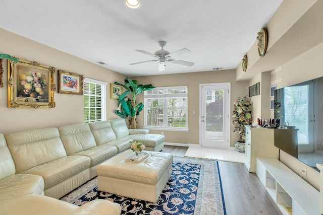 7 Marisa Dr, Middle Island, NY 11953 - living area with ceiling fan, light wood finished floors, and recessed lighting