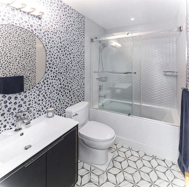 16 Rockledge Ave Unit 5D-2, Ossining, NY 10562 - full bath with toilet, combined bath / shower with glass door, vanity, and tile patterned floors
