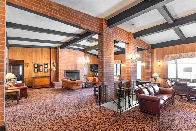 16 Rockledge Ave Unit 5D-2, Ossining, NY 10562 - carpeted living area featuring a brick fireplace, wood walls, and a chandelier