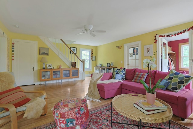 2 Amber Ridge Rd, Chestnut Ridge, NY 10977 - living room featuring healthy amount of natural light, stairway, wood finished floors, and a ceiling fan